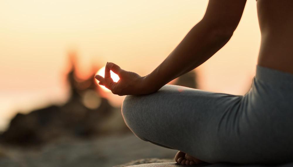 woman meditating showing Natural Anxiety Remedies