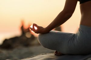 woman meditating showing Natural Anxiety Remedies
