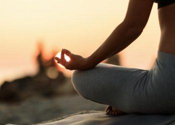 woman meditating showing Natural Anxiety Remedies