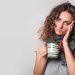 Tired woman holding coffee cup suffering from adrenal fatigue mistakes