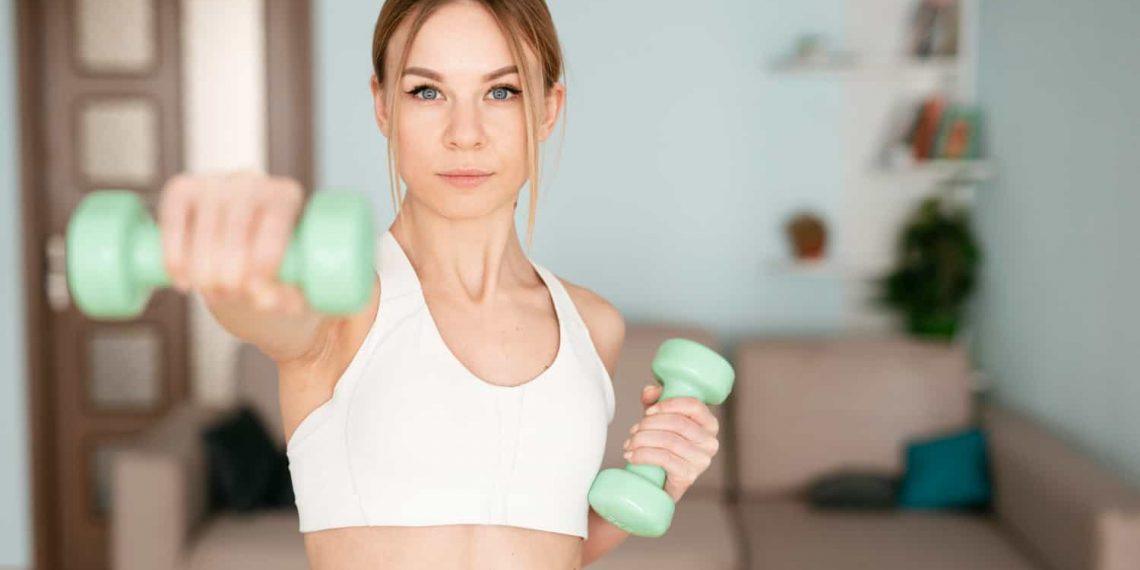 Woman doing strength training to burn fat faster for women