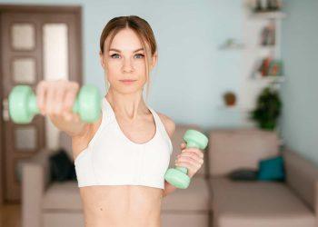 Woman doing strength training to burn fat faster for women