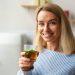 Woman enjoying herbal tea to lose weight drinking tea