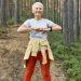 Woman walking through nature trail promoting a healthy lifestyle at any age
