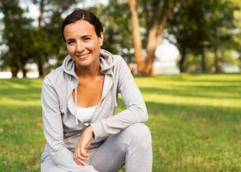 Energized woman practicing yoga with American Promise healthy living focus