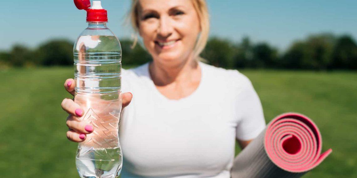 Woman feeling energized after detox for energy and digestion