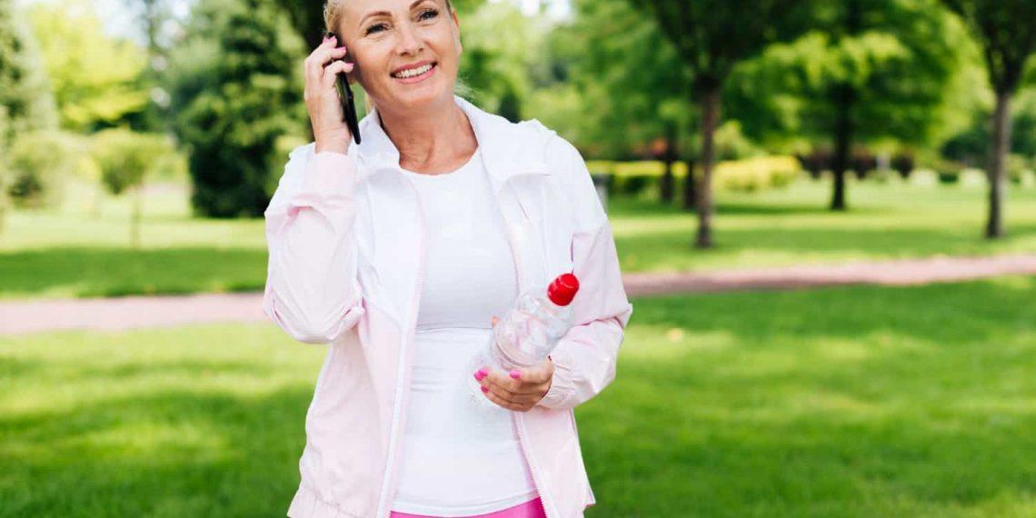 Woman jogging at sunrise to lose weight fast naturally and permanently