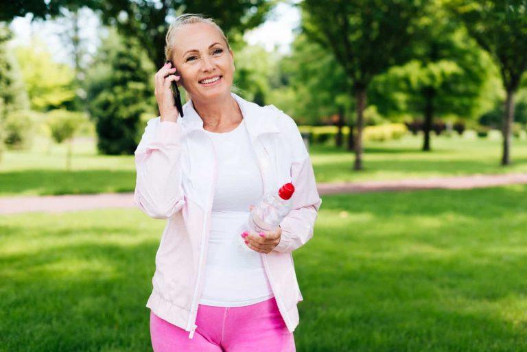 Woman jogging at sunrise to lose weight fast naturally and permanently