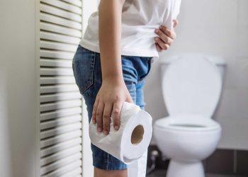 woman celebrating pooping weight loss benefits