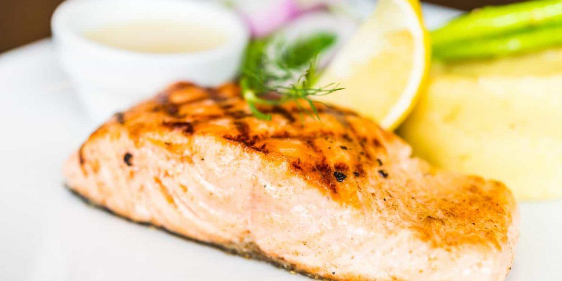 Grilled salmon with lemon, a rich source of vitamin D foods