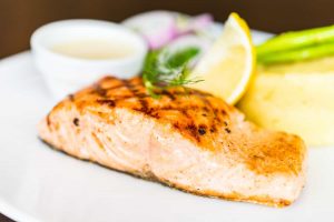 Grilled salmon with lemon, a rich source of vitamin D foods