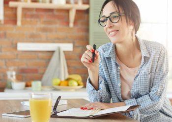 Woman practicing 20-20-20 rule to improve vision naturally