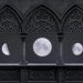 Phases of the moon aligned within Gothic arches at night.