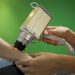 Laser treatment on patient’s arm by medical professional.