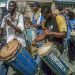 Drummers playing traditional music at a street festival.