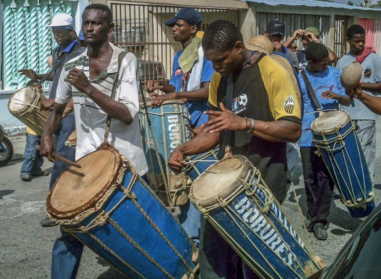 Drummers playing traditional music at a street festival.
