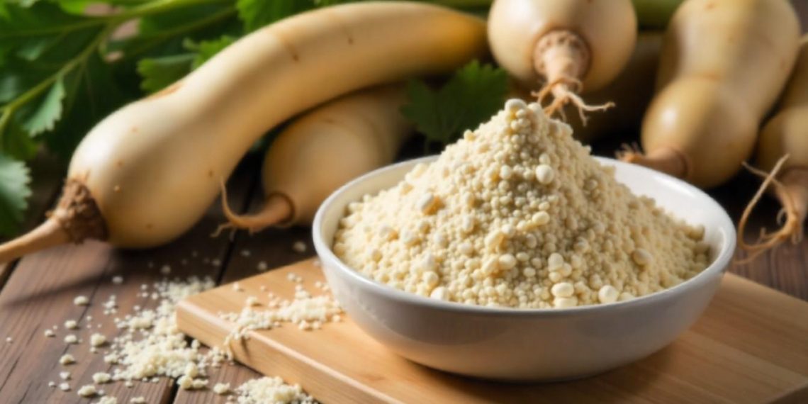 Bowl of couscous on wooden board with fresh squash in background