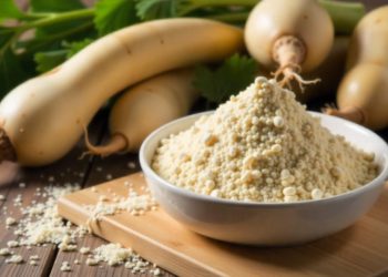Bowl of couscous on wooden board with fresh squash in background