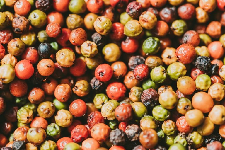 Colorful peppercorns in variety, perfect for spicing up dishes.