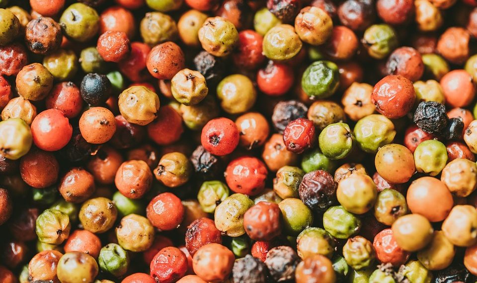 Colorful peppercorns in variety, perfect for spicing up dishes.