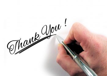 Handwriting Thank You! with a pen in calligraphy style.