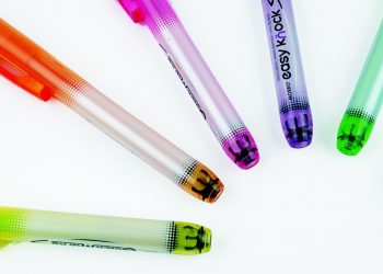 Colorful gel pens arranged in a circle pattern on a white background.