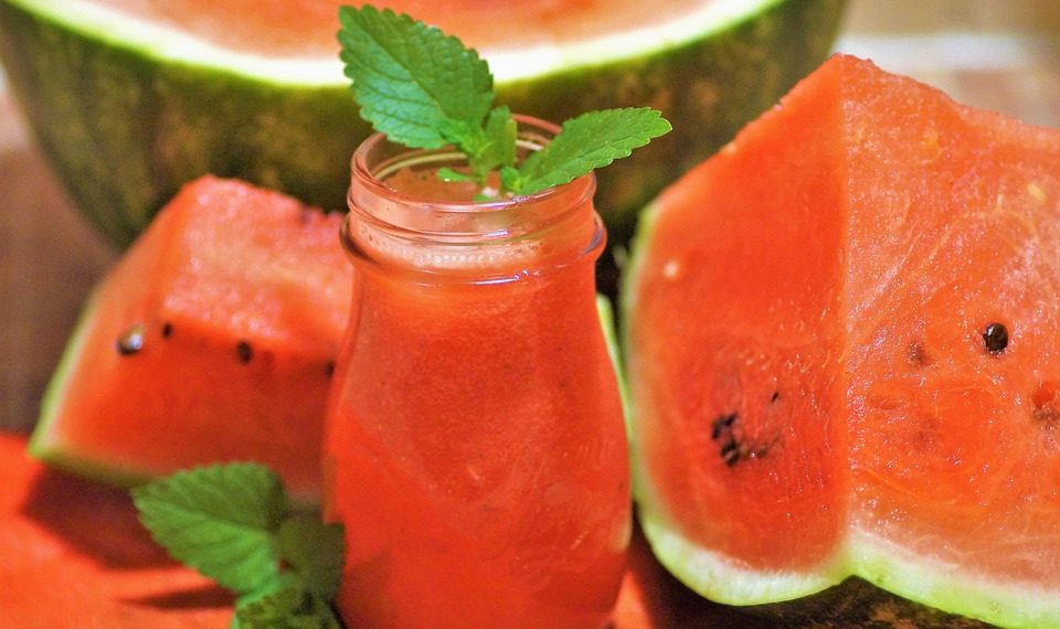 Refreshing watermelon juice with mint leaves.