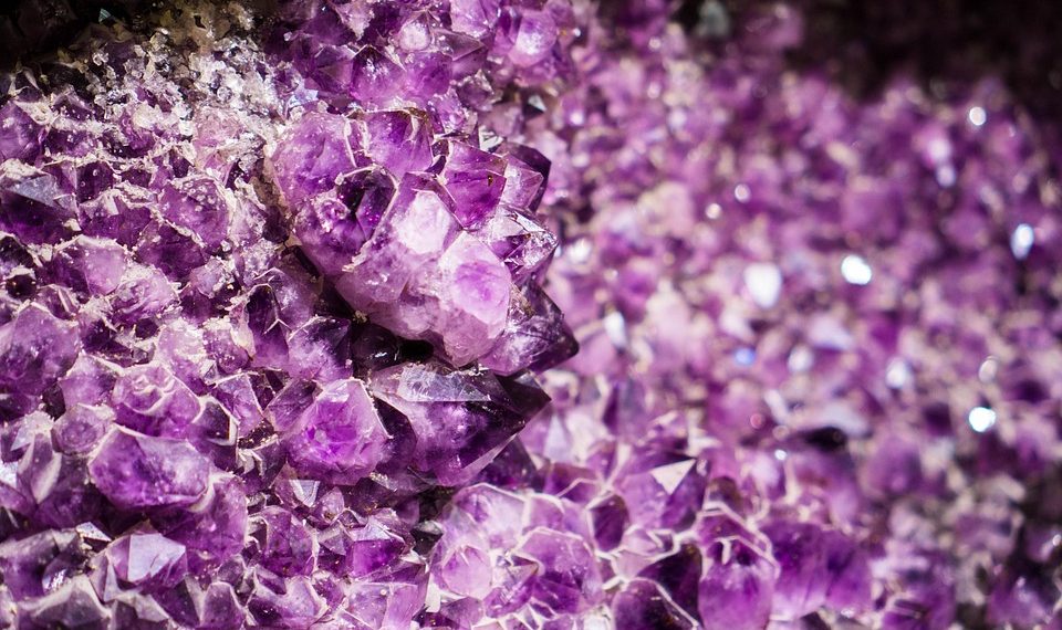Purple amethyst crystals in close-up view.