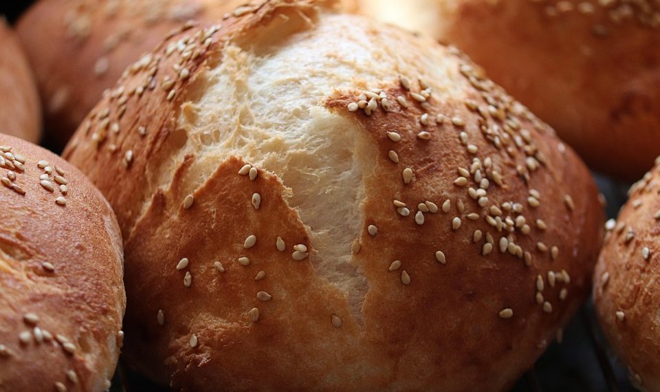 Sesame seed bun with golden crust.