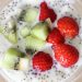Kiwi and strawberries with chia seeds in yogurt.