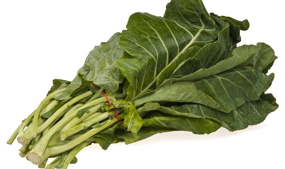 Fresh collard greens with crisp green leaves.
