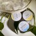 Hemp body balms with natural ingredients in a pouch.