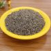 Cumin seeds on yellow plate, ideal for flavorful cooking.