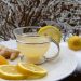 Warm lemon ginger tea with fresh citrus and ginger on a snowy day.