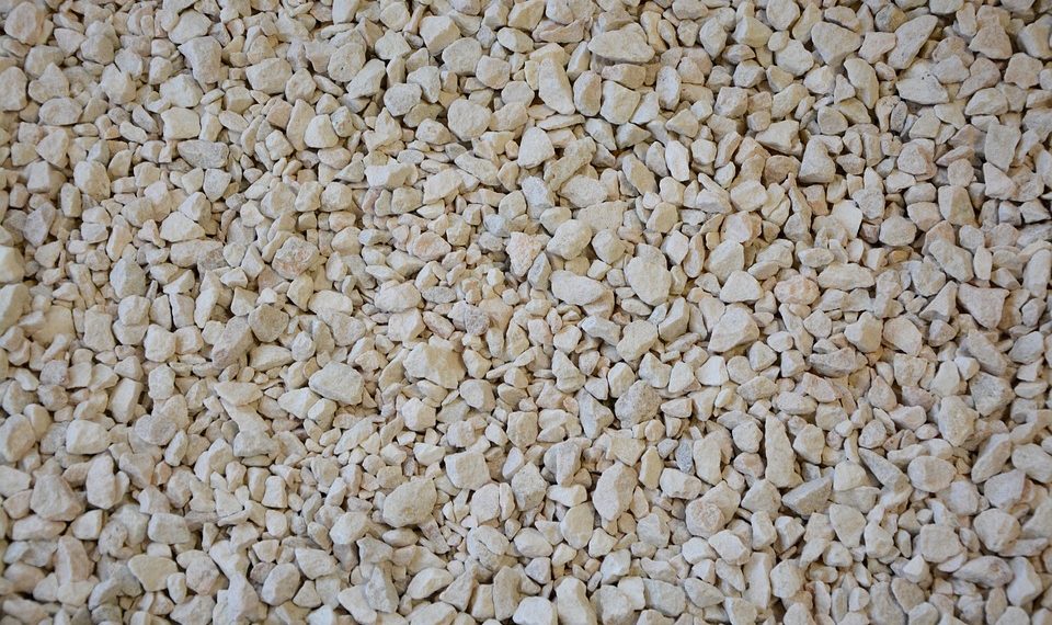Small beige stones forming a gravel texture.