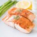 Grilled salmon with asparagus and lemon sauce.