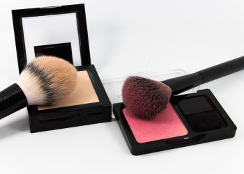 Makeup brushes with blush and face powder sets.