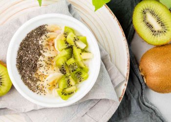 Chia seed yogurt bowl with banana and kiwi slices.