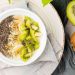 Chia seed yogurt bowl with banana and kiwi slices.
