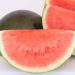 Sliced watermelon segments on a white background.