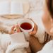 Cozy morning with a book and hot tea.