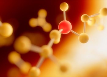 Atoms connected in a molecular structure with a glowing background.
