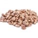 Raw cashew nuts piled on white background.