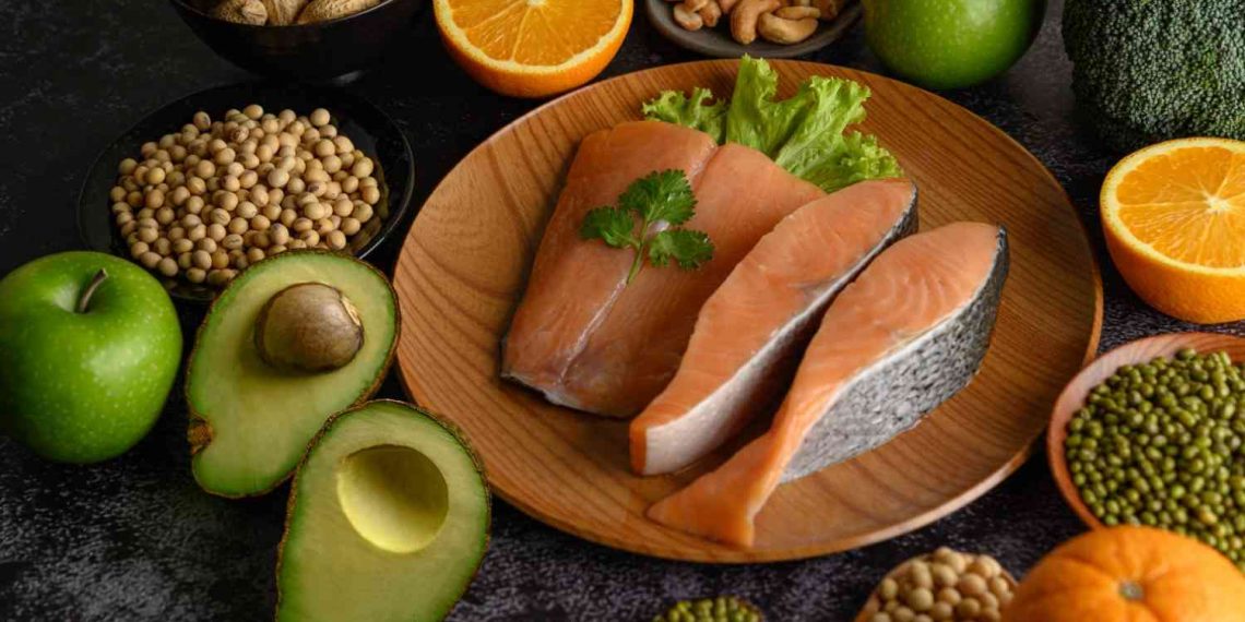 Salmon with fresh fruits and nuts, healthy eating.