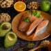 Salmon with fresh fruits and nuts, healthy eating.