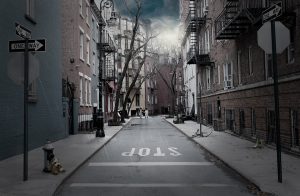 Deserted urban street with teddy bear under stormy skies.