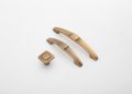 Bronze cabinet handles and knob displayed on white background.