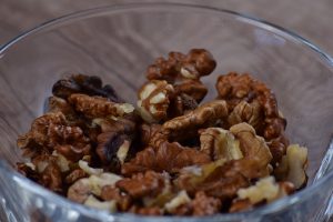 Walnuts in a glass bowl.