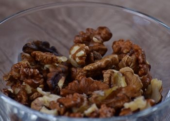 Walnuts in a glass bowl.