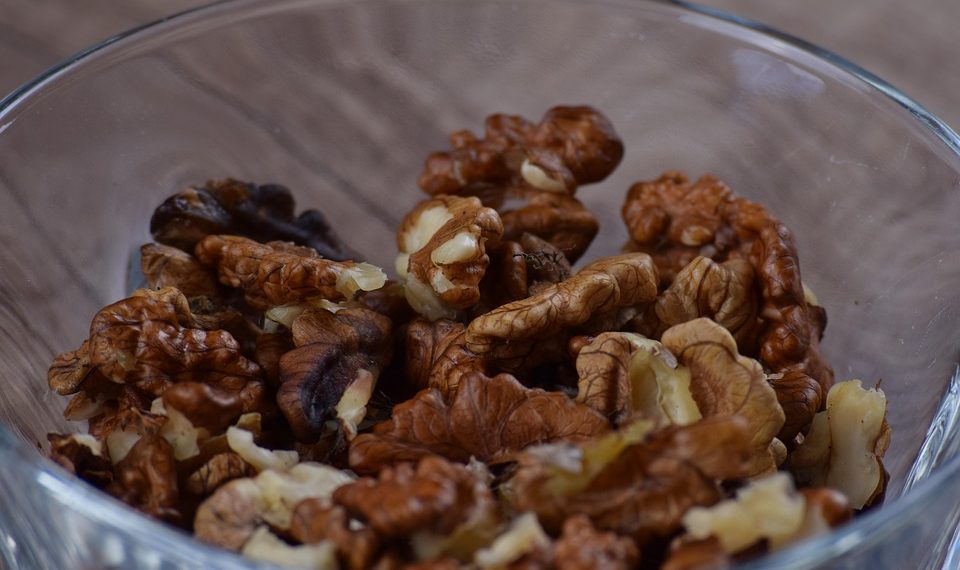 Walnuts in a glass bowl.